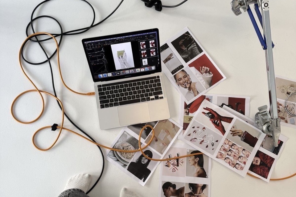 Behind-the-scenes flat lay of a moodboard shoot